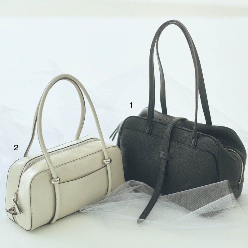 1. ソフトなレザーでカジュアル派にぴったり。マチが広くてざくざく入る。バッグ［Ｈ19×Ｗ29×Ｄ15］¥55,000(ヴァジック／ヴァジックジャパン) 　2. クラシカルな横長形が今っぽい。見た目以上の収納力があり、ジッパーが大きく開き出し入れもスムーズ。バッグ［Ｈ14×Ｗ28×Ｄ10］¥14,300(アルテミス by ダイアナ／アルテミス by ダイアナ アーバンドック ららぽーと 豊洲店)